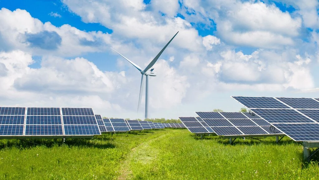 Solar panels and a wind turbine installed by TRE Energy
