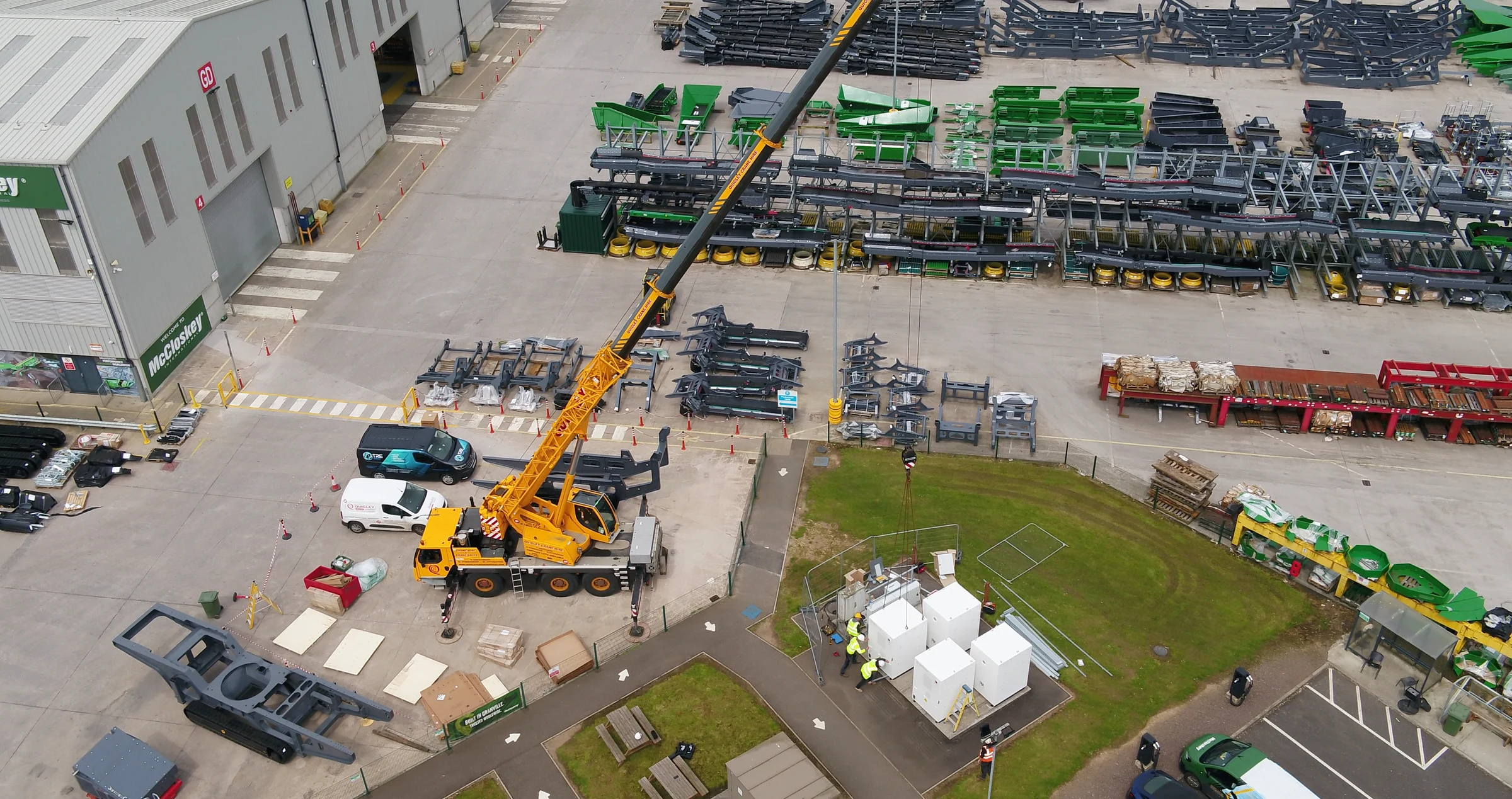 TRE Energy crew and crane positioning battery cabinets on the McCloskey International site (photo 1 of 4)