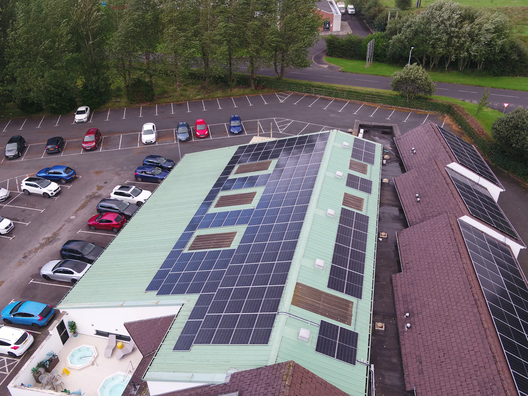 Aerial view of solar panels across the White Horse Hotel roofs, Eglinton