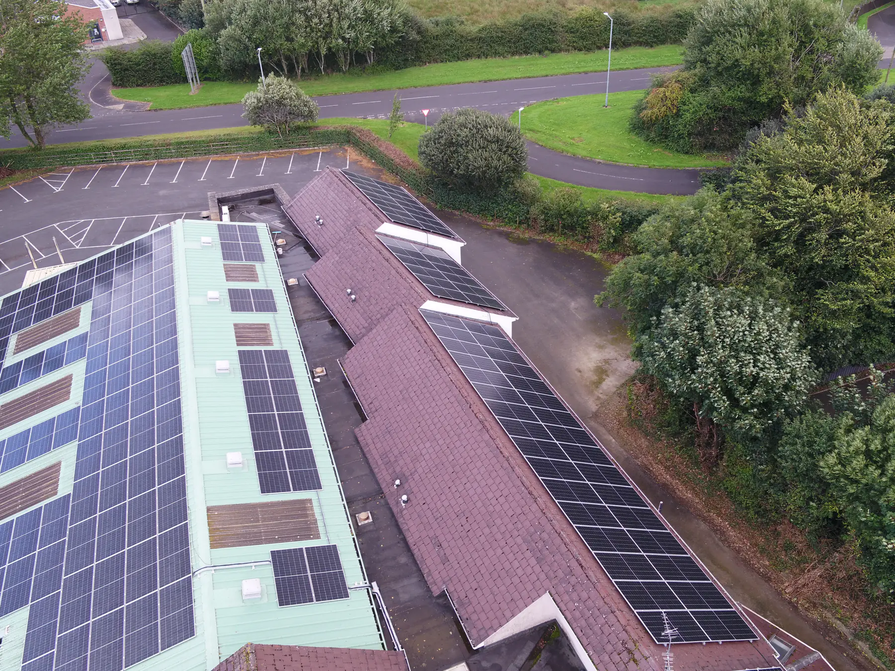 Solar panels on the White Horse Hotel’s pitched roofs beside the car park